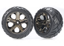 TRAXXAS Tires & wheels, assembled, glued (All-Star black chrome wheels, Anaconda® tires, foam inserts) (nitro rear/ electric front) (1 left, 1 right) 3776A