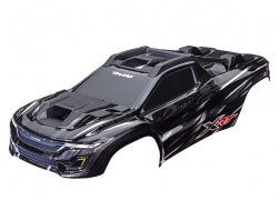 TRAXXAS Body, XRT®, black (painted, decals applied) (assembled with front & rear body supports for clipless mounting, roof & hood skid pads) 7840
